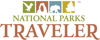 Unknown National Parks Traveler logo with five colored square icons above green “NATIONAL PARKS” and brown “TRAVELER” lettering.