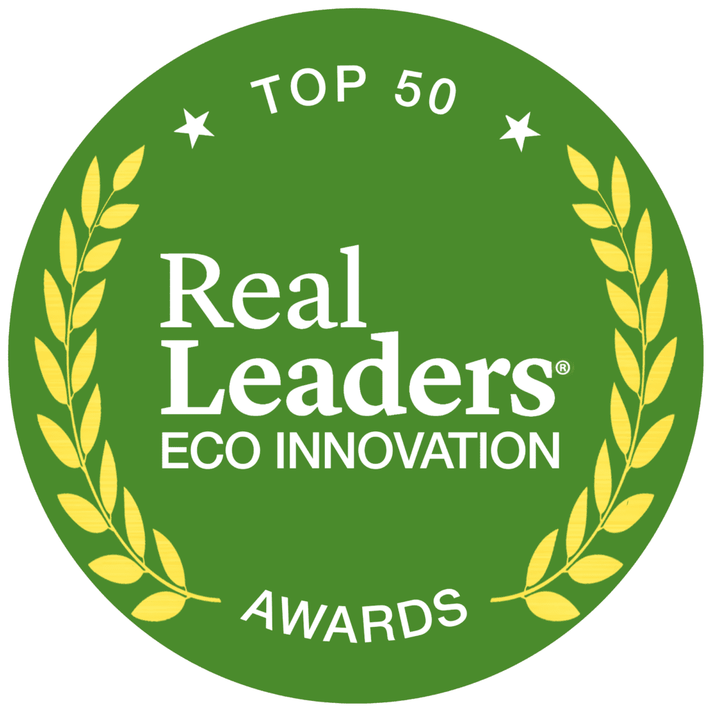 realleaders Green circular badge with laurel wreaths says "Top 50 - Real Leaders Eco Innovation - Awards".