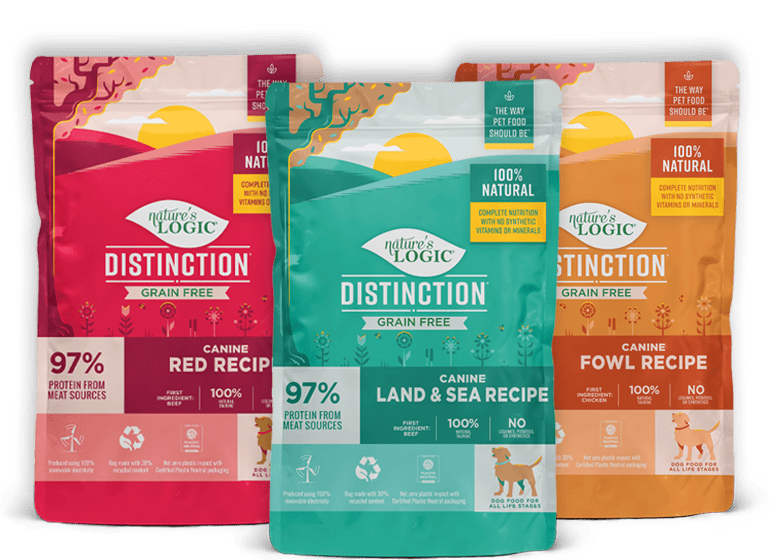 grainfree-3b Red, teal, & orange bags of Nature's Logic Grain Free Distinction Recipe dog food bags.