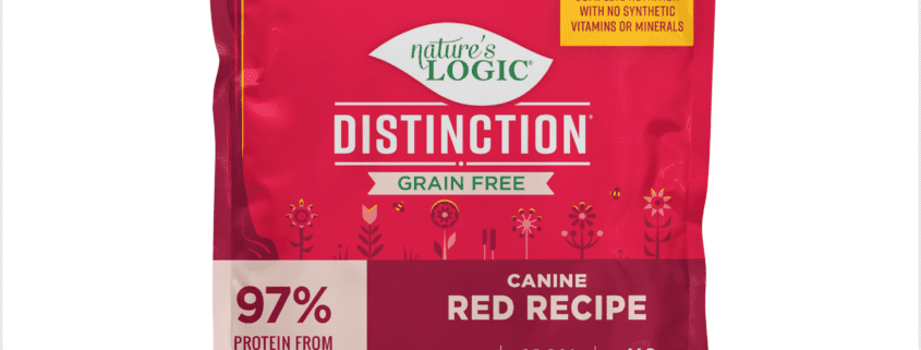 Distinction GF Red Recipe Front Red snack bag with a pink label and a yellow circular logo.